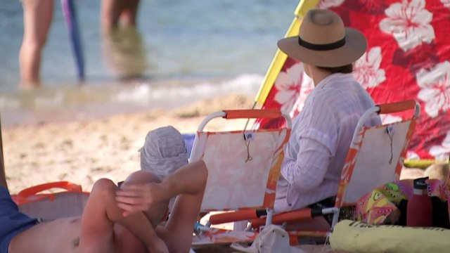 Woman dies after getting caught in rip with two children at Coffs Harbour beach