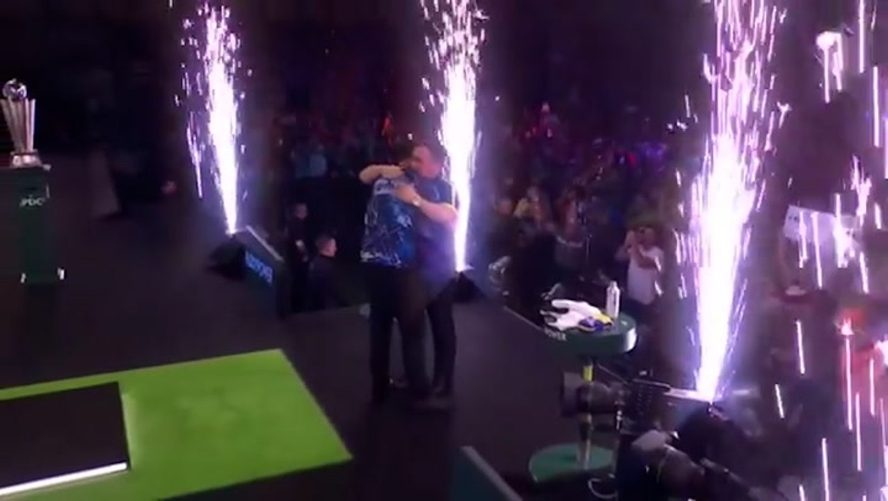 Luke Humphries embraces teenage Luke Littler after World Darts Championship final