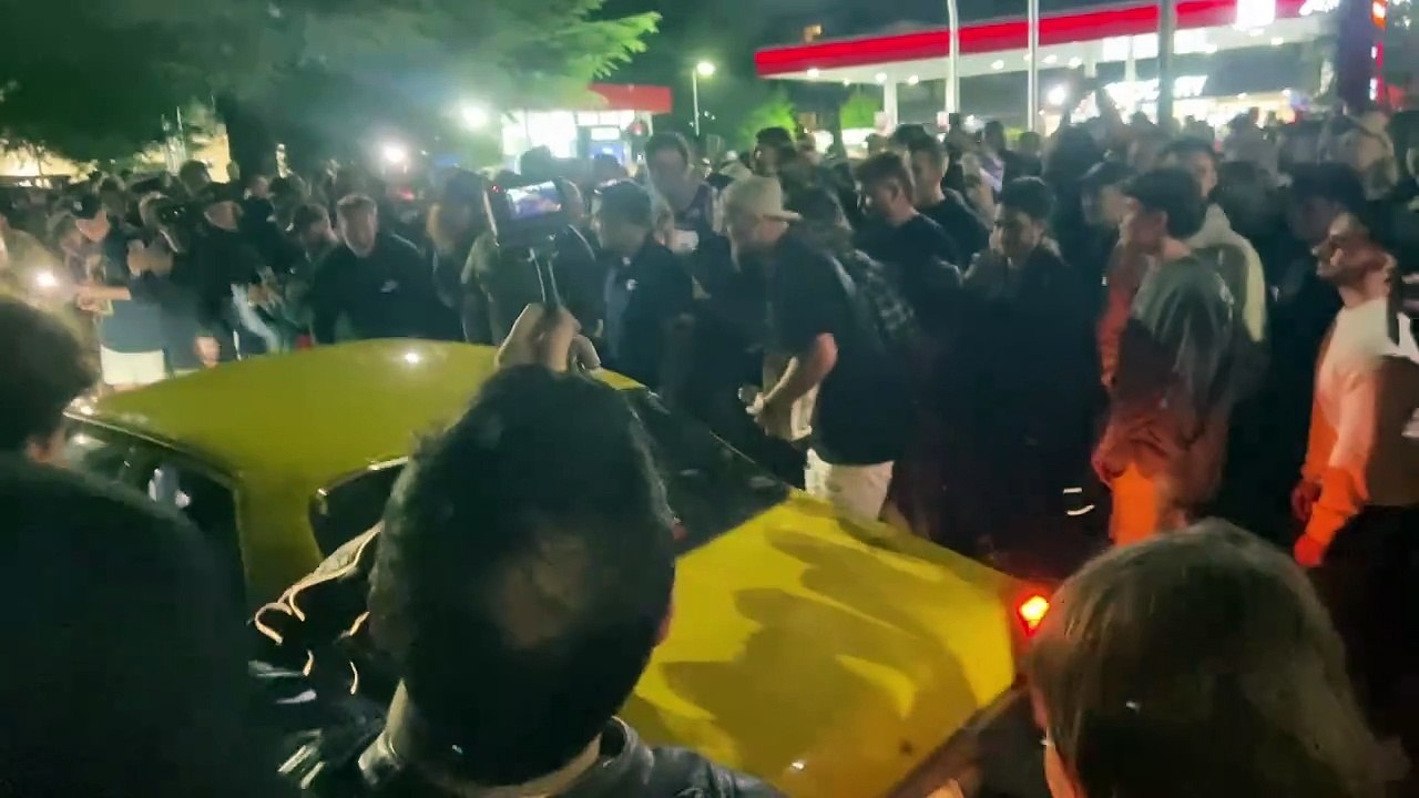 ACT police appear to escort Holden away from Summernats Braddon