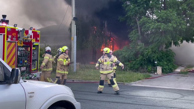 Firefighters save dog from burning building in North Bendigo