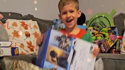 Boy ready to play a symphony of unfathomable glee after being surprised with PS5