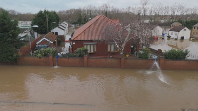 Homes across UK face power outages as flooding spills into homes