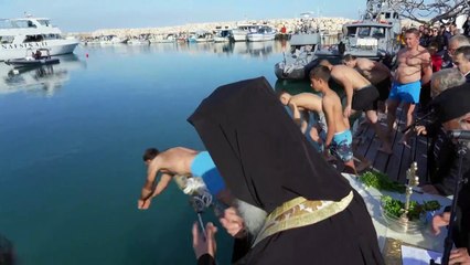Cypriots participate in the Blessing of the Waters to celebrate Epiphany Day