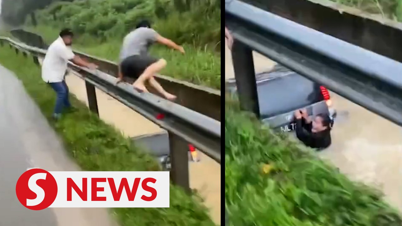Floods: Man's swift action saves a woman from being swept away in Johor