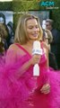 Margot Robbie stuns in 'Barbie' pink at the Golden Globes 2024 red carpet!