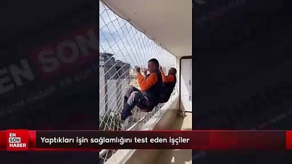 Yaptıkları işin sağlamlığını test eden işçiler