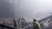 Russian emergency services wade through rubble at site of Moscow attack that killed 143