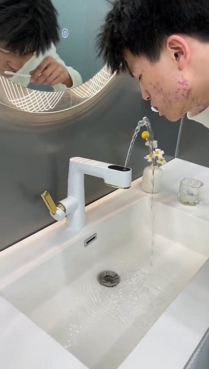 The combination of a waterfall flow and a digital display makes this Basin Faucet a true work of art.