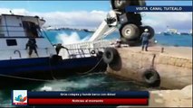 Grúa colapsa y hunde barco con diésel