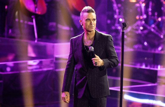 Robbie Williams worried he was ugly when people stopped questioning his sexuality