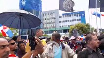 Antigua orden dominicana marcha en rechazo de los campos de refugiados en RD