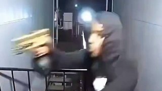 Woman saves her boyfriend from armed robbers