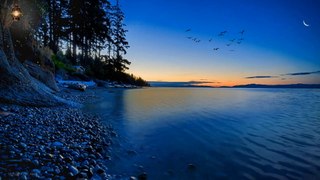Nature miracle: The quiet of a gentle lake at dusk