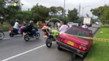 Mataron a un hombre a bala y lo tiraron de un carro en el puente de Guayabal