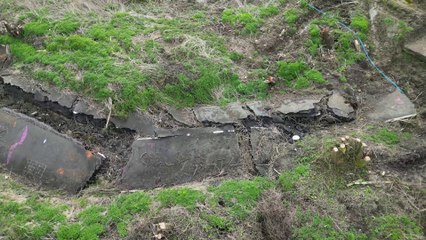 Road looked like an earthquake zone after storm damage