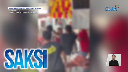Grupo ng mga lalaki, nagrambol sa sidewalk | Saksi