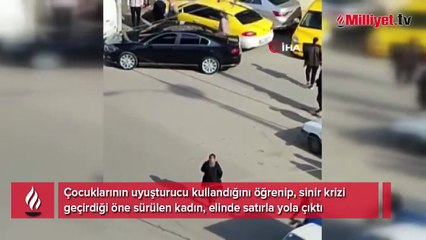 Elinde satırla sokağa çıktı! "Kocam buraya gelsin"