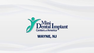 Does Insurance Cover Implant Dentures? | Mini Dental Implants in Wayne, NJ | Bruce Fine DDS
