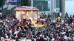 Philippine Catholics swarm Christ icon with 'healing powers' in massive parade
