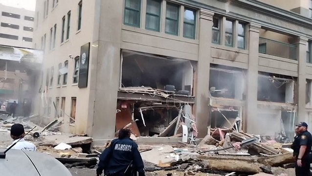 Texas explosion: Debris scattered across street as smoke rises from building