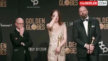 Altın Küre Ödüllerinde en iyi oyuncu ödülünü alan Emma Stone, yakın arkadaşı Taylor Swift'e kameralar önünde küfür etti