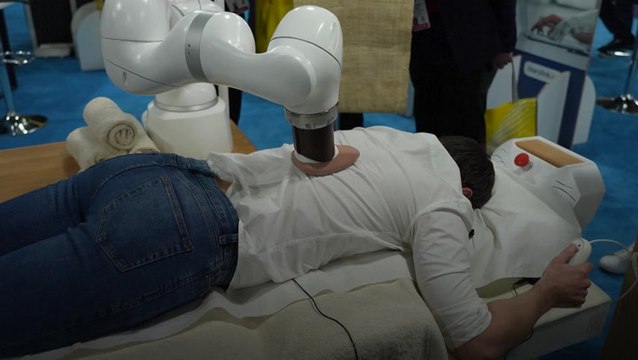 AI masseuse with robotic arm goes on display at CES tech show in Las Vegas