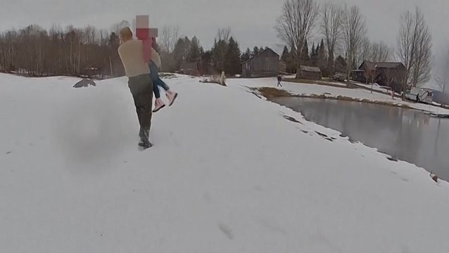 US state trooper plunges into icy pond to save eight-year-old girl in body cam footage