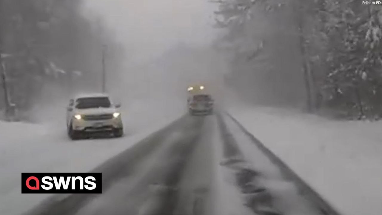 Vehicle skids on snowy road and narrowly avoids police car in Pelham, Massachusetts