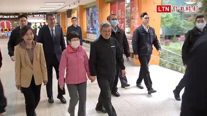 陳建仁與妻子投票支持自由民主，展現公民參與熱情🗳️