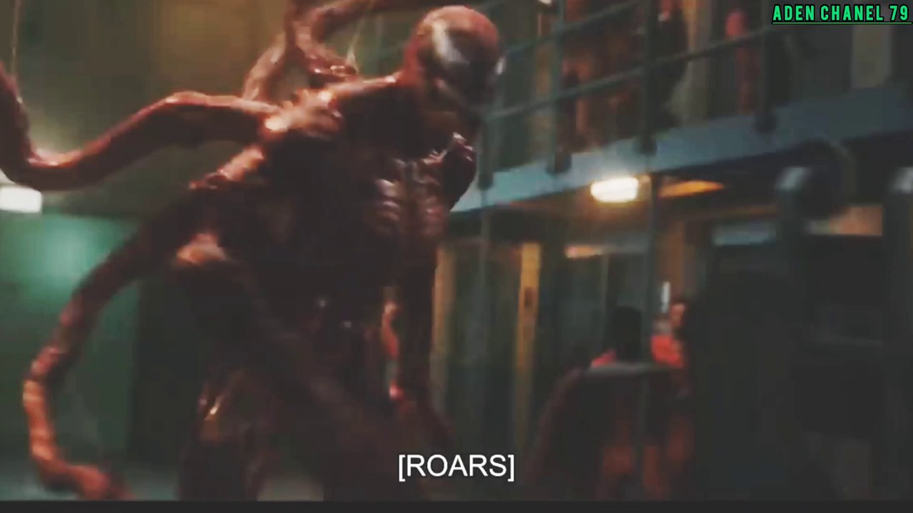 movie of the fight of the powerful red lizard monster against final venom