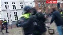 Hollanda'da Kur'an-ı Kerim'in yakılmasına engel olmak isteyen protestoculara polisten sert müdahale