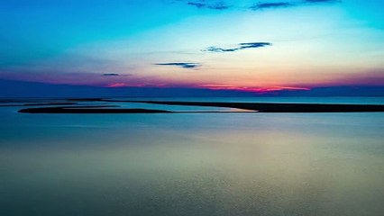 Sunrise seen from a river, landscape