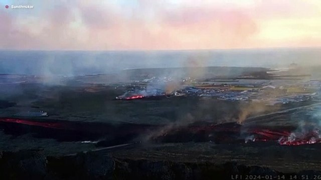 Buildings catch fire after Icelandic volcano erupts