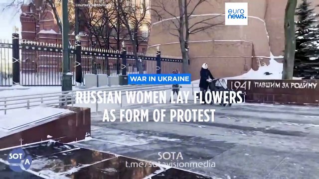 Wives of Russian soldiers lay flowers in Moscow to protest against the Kremlin