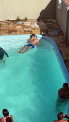 Man in Pool Tries to Save His Drink