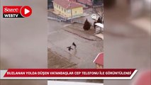 Buzlanan yolda düşen vatandaşlar cep telefonu ile görüntülendi