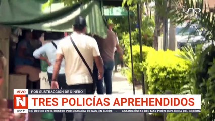 TRES POLICÍAS APREHENDIDOS