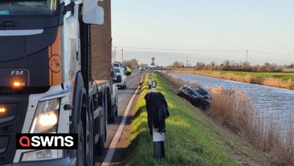 Hero lorry driver saves motorist whose car plunged into freezing water-filled ditch