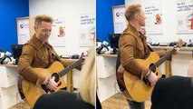 Ronan Keating surprises Tesco shoppers with impromptu in-store performance