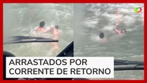 Vídeo mostra salvamento de casal arrastado por corrente de retorno no litoral de SP