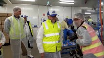 Prime Minister visits salmon processing factory as government considers further regulation