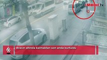 Aracın altında kalmaktan son anda kurtuldu