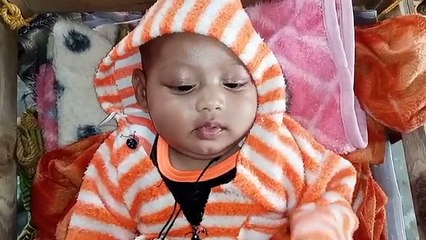 I am swinging comfortably on the swing. Dad is making a video. Rayhan Nadir Rana