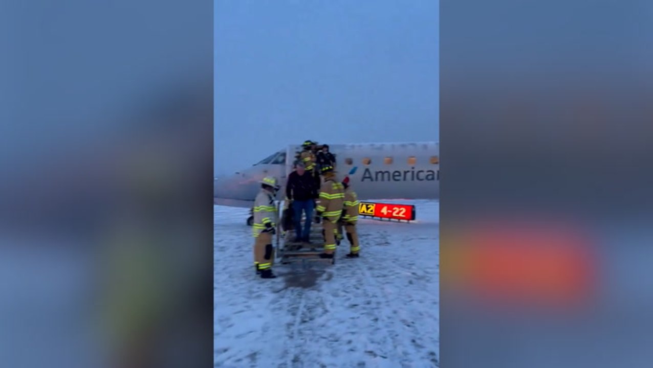 Watch: American Airlines plane carrying 53 passengers skids off icy New York airport runway