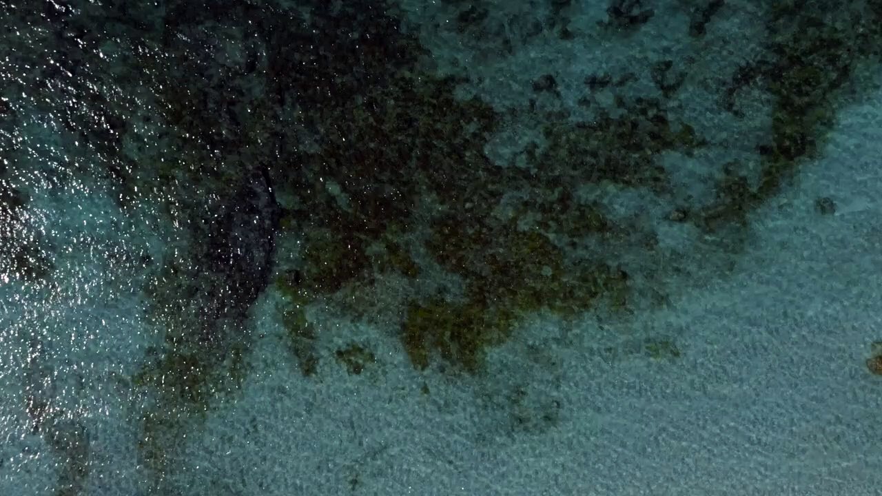 Crystal clear emerald water in a view from high above