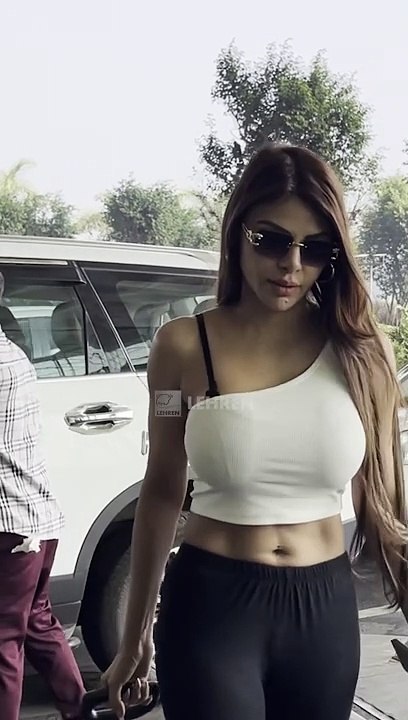 Sherlyn Chopra's Sizzling White & Black Bomb Look At Airport