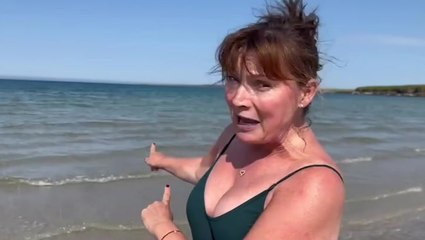 Lorraine Kelly, 64, takes brave dip in cold sea to celebrate debut novel