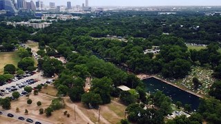 aerial shot of a park around a river 4K Background Video No Copy Right
