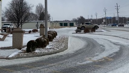 Stoic performer: Flag pole dances amidst the bone-chilling breeze