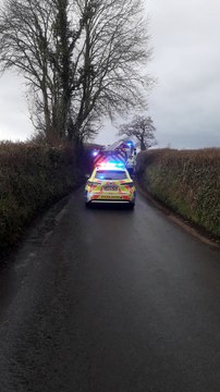 The scene of a car crash on icy Burchills Hill, Wellington, filmed by Chris Penney.